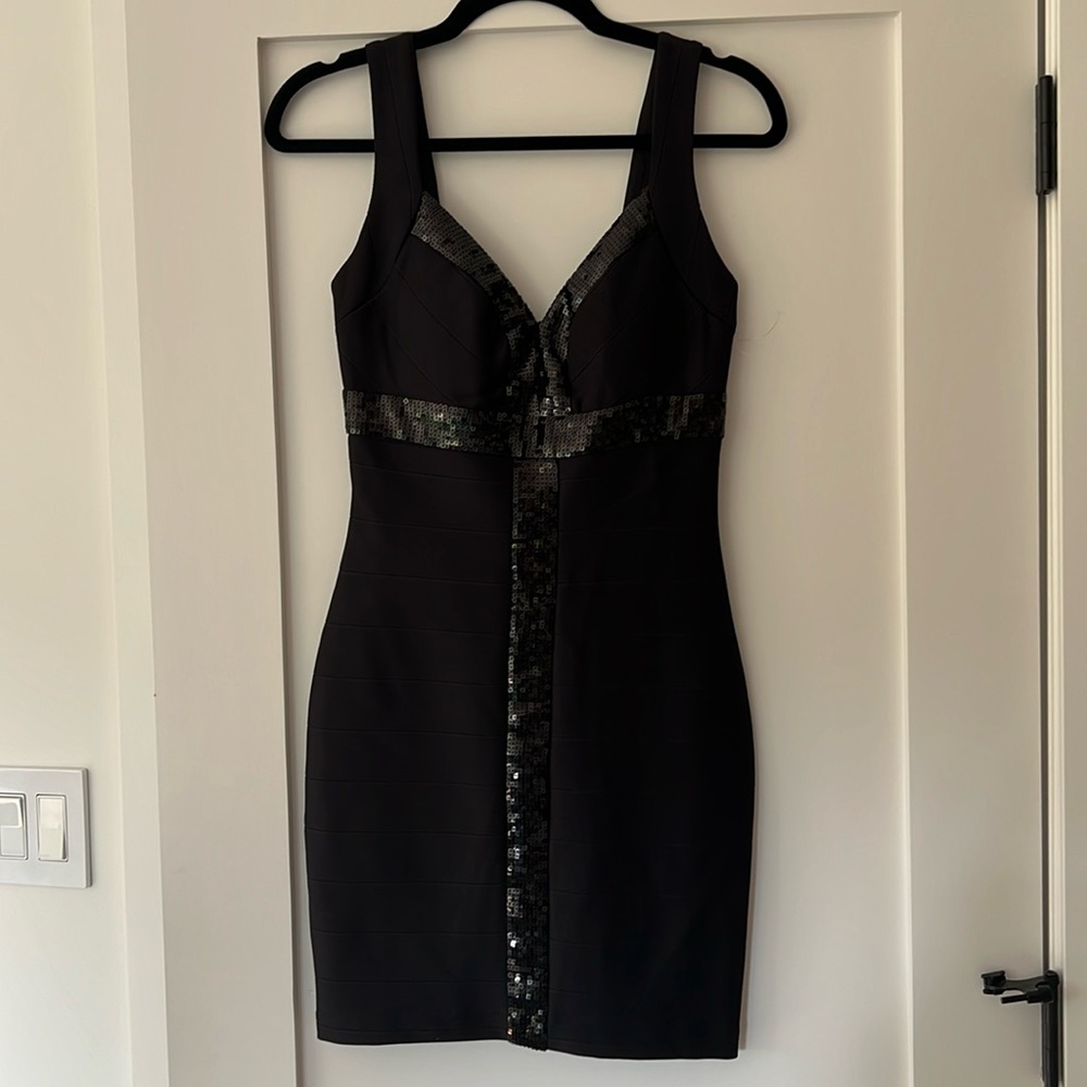New black mini dress size small. Sequins. Form fitting.